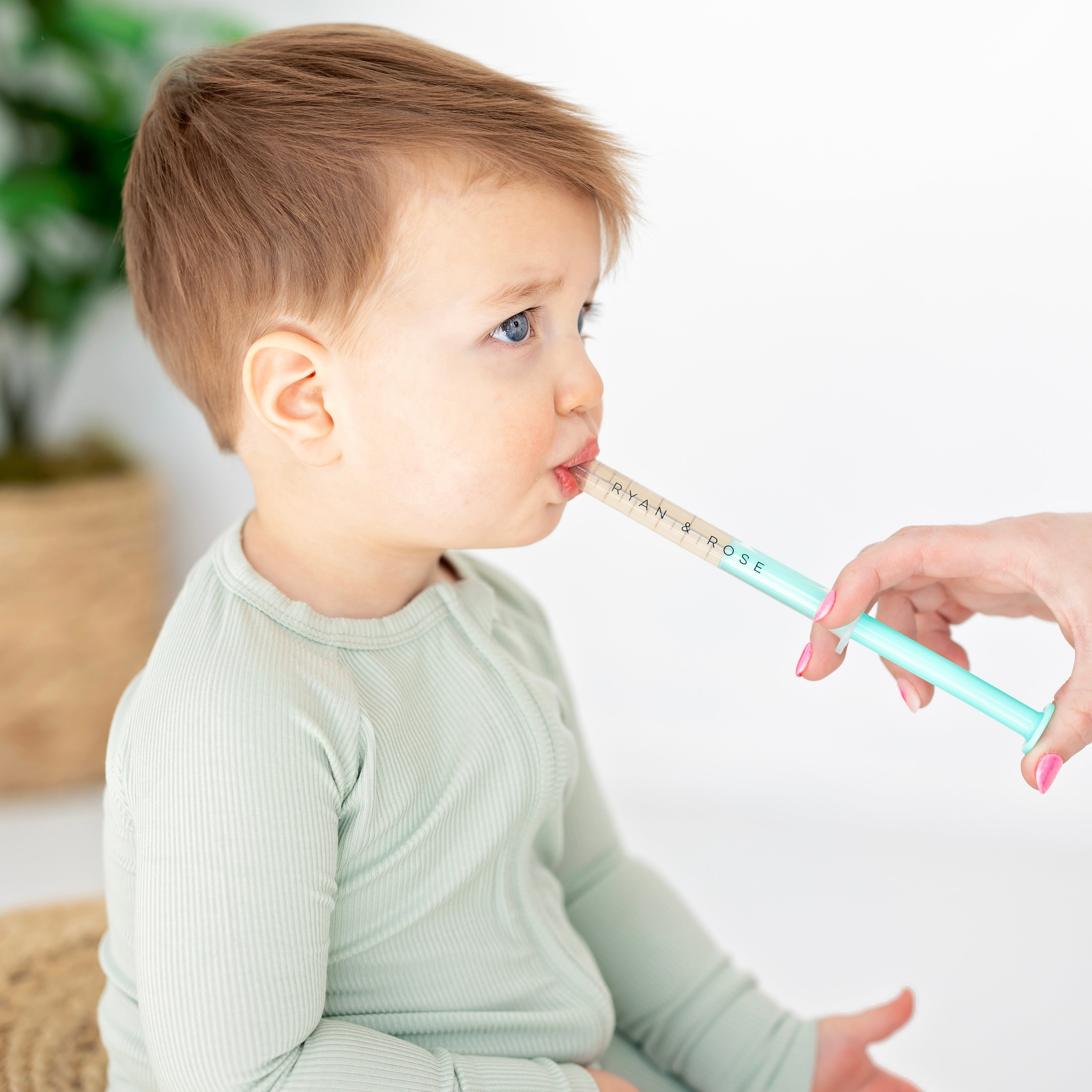 baby getting medicine with cutie dose