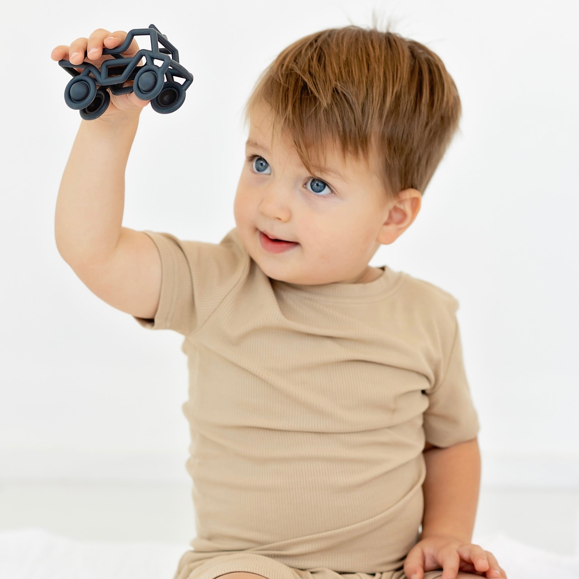 Baby playing with Banshee Teether