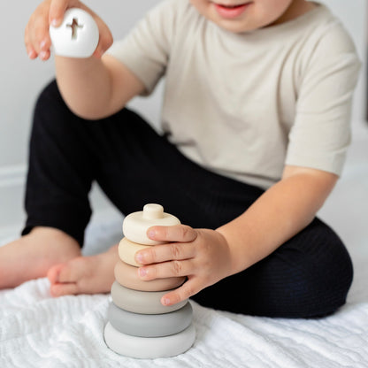 Baby playing with Cross Stacker