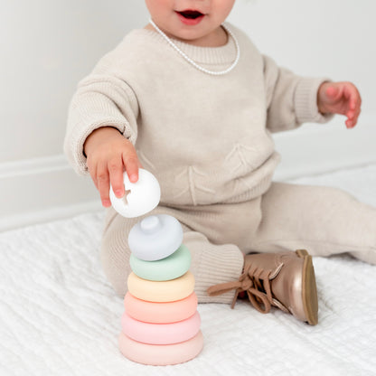 Baby playing with Cross Stacker