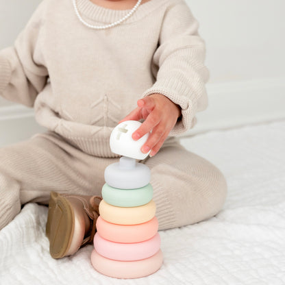 Baby playing with Cross Stacker