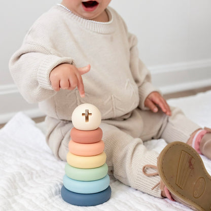 Baby playing with Cross Stacker