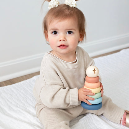 Baby playing with Cross Stacker