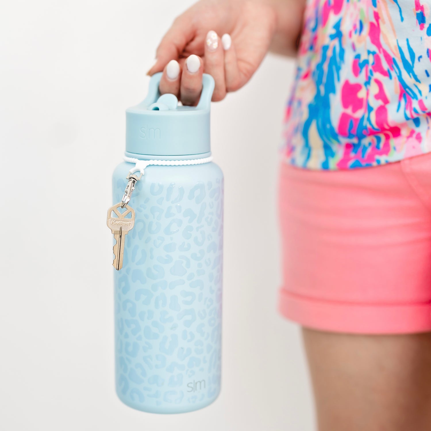 Girl holding water bottle