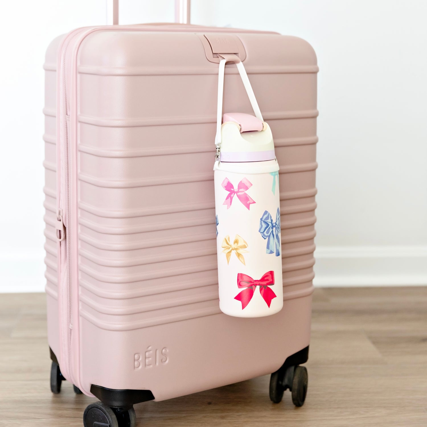 Water bottle on suitcase