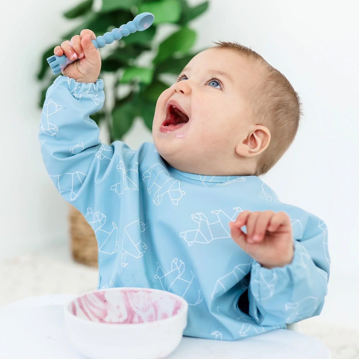 Baby eating with Tensils 