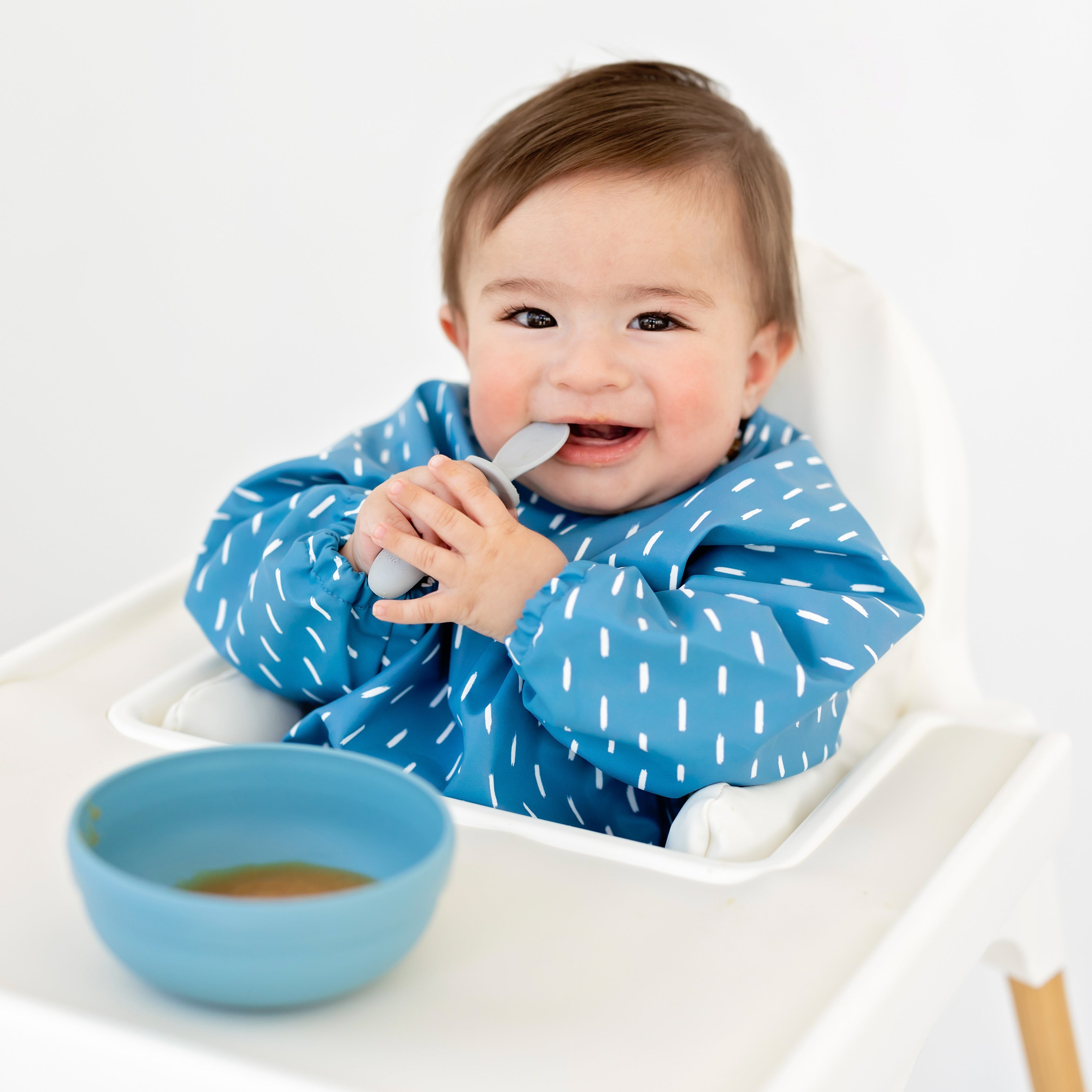 Baby eating with spoonie
